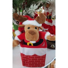 BABBO NATALE PELUCHE MUSICALEIN CAMINO CHE SALE E SCENDE 